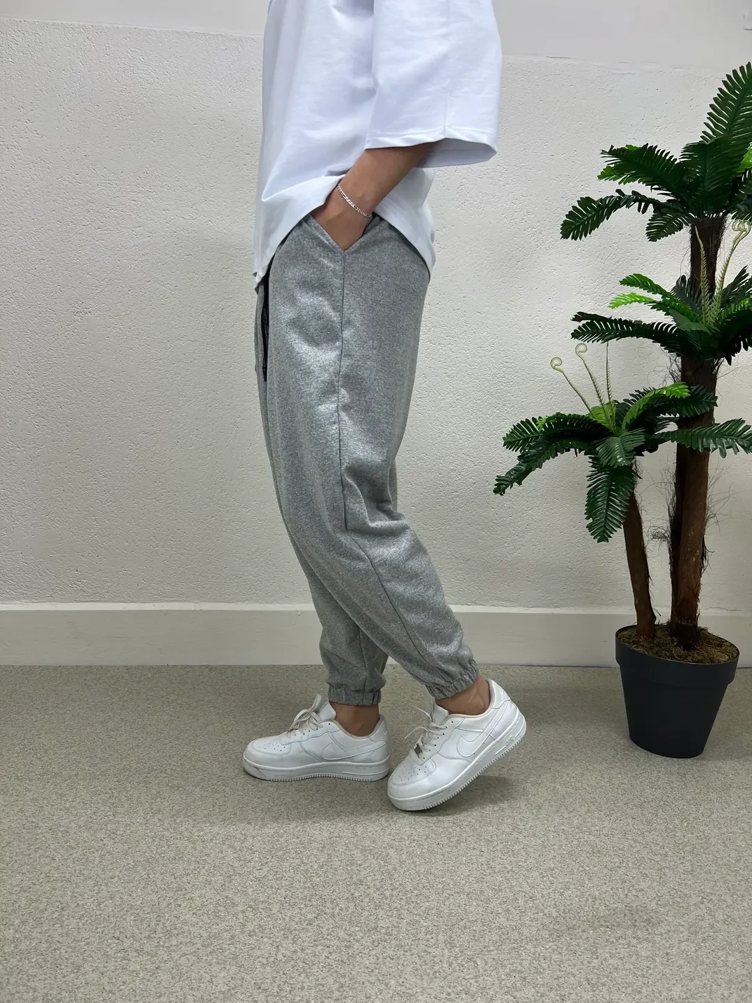 Erkek Açık Gri Beli ve Paçası Lastikli Bol Kesim Cepli Jogger Eşofman Altı HZL24S-MXC8989-211