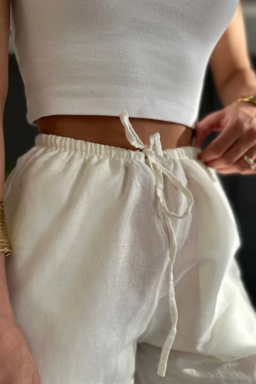 Kadın Beyaz Cepli Beli Lastikli Bol Paça Keten Pantolon HZL24S-ZK11051